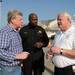 Dexter Fire Chief Loren Yates, right, talks with Washtenaw County Sheriff Jerry Clayton, center, and Michigan representative Mark Ouimet March 16, 2012, on the corner of Noble Dr. and York St. where houses were severely damaged by a tornado that hit Dexter. Angela J. Cesere | AnnArbor.com
